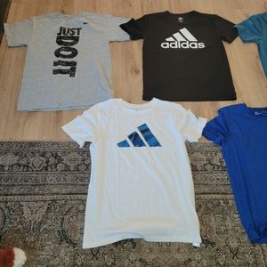 Five short sleeve shirts. Youth XL / Men's S.